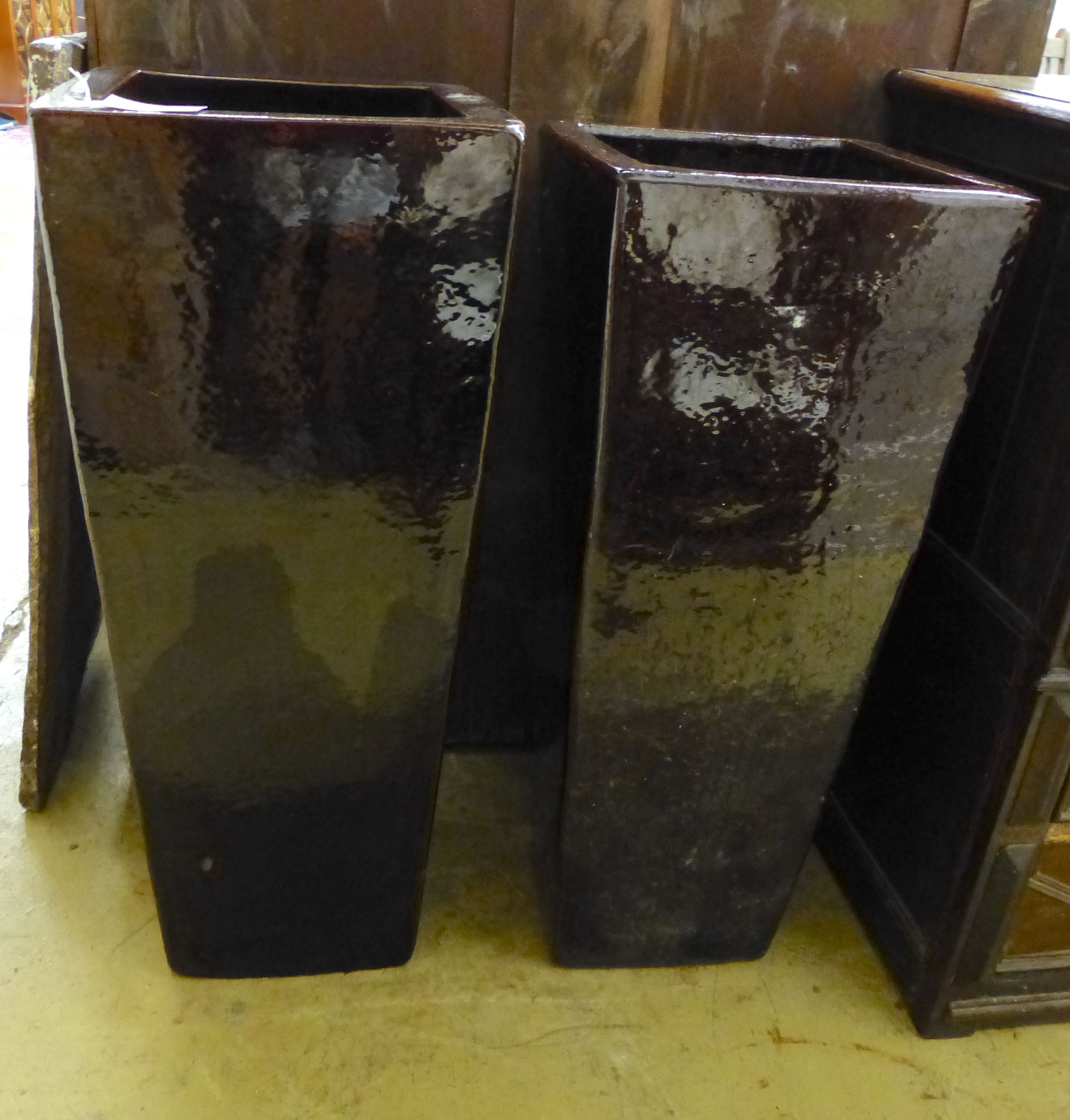 A pair of large brown glazed pottery garden planters, height 91cm